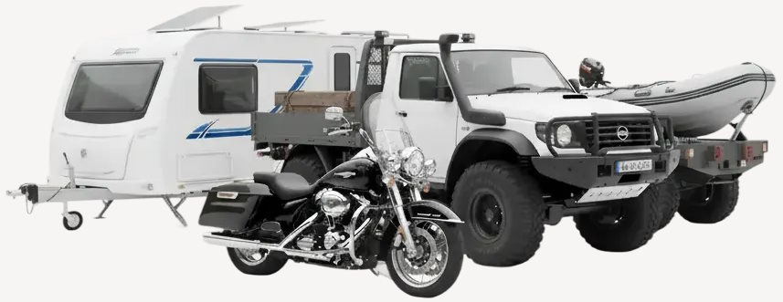 Multiple vehicles including cars, motorcycles, boats, caravans